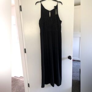 NWT. Long black dress. Fabric stretch.